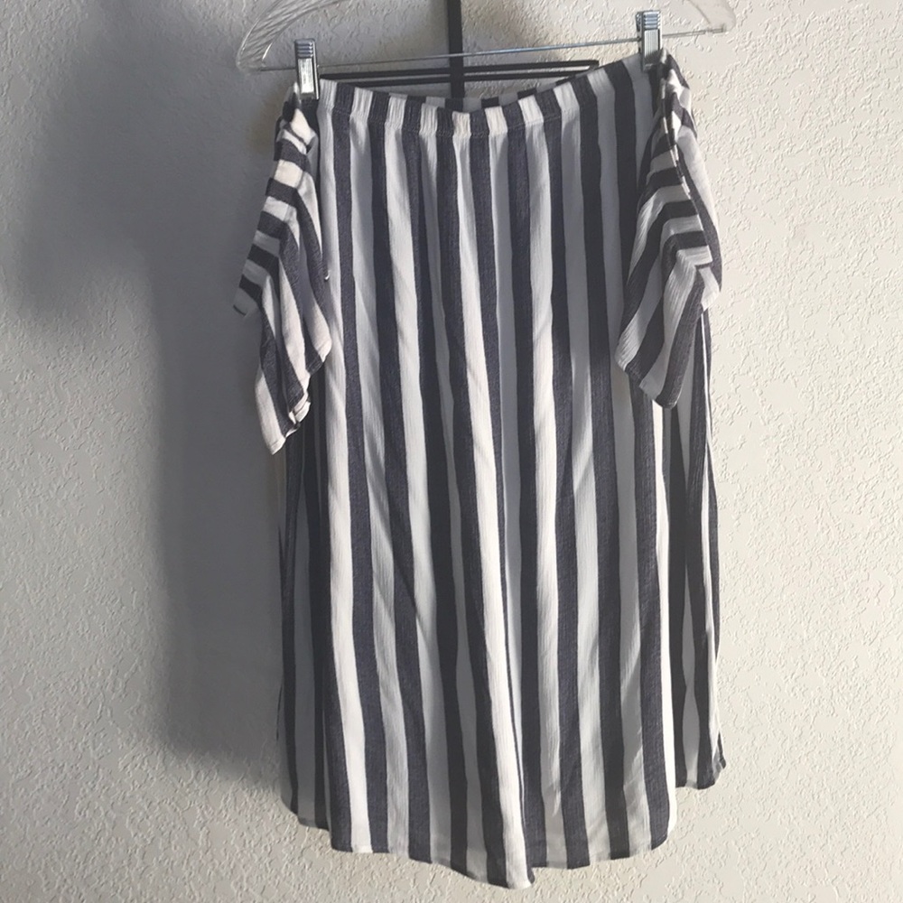 Blue and white off the shoulder dress.